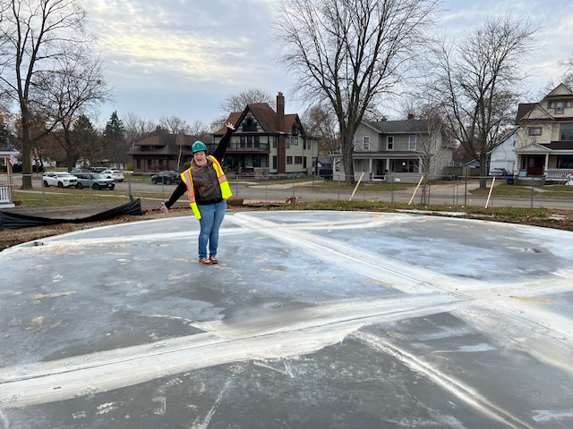 Youth Services Librarian standing on base in Discover Zone